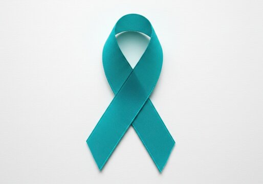 A teal ribbon displayed on a white background symbolizing support and awareness for a cause or organization