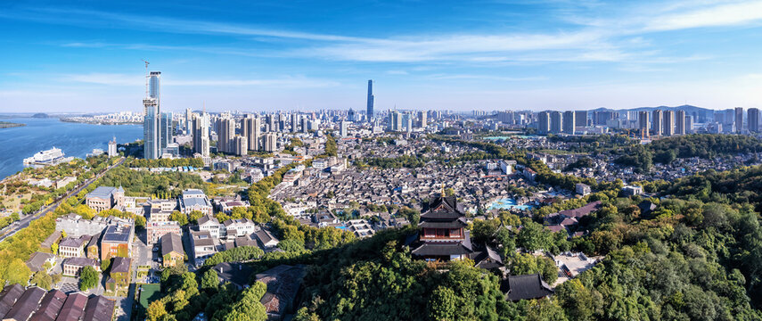 A Stunning Panoramic View of a Modern Urban Skyline with Natural Surroundings