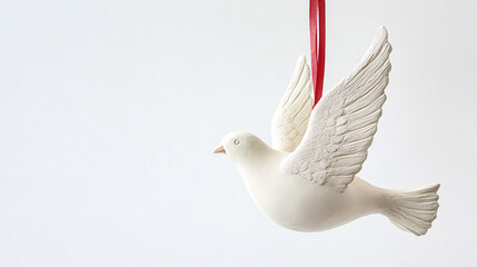 White Dove Ornament on Red Ribbon Symbolizing Peace and Hope