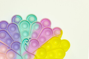 Colorful rainbow poppit relaxing game with white background