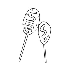 Two sticks of hot dog with mustard on them