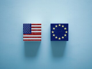 Flat lay of European Union and United States flags on light blue background symbolizing diplomacy, international relations, and cooperation in minimalistic and clean composition.
