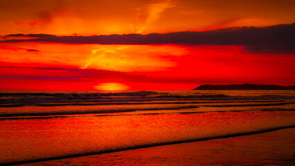 As the sun began its descent at Morro Bay California, it was casting a warm, golden hue across the landscape. Morro Bay came alive with the breathtaking spectacle of a beautiful sunset