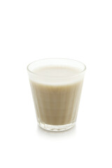 oat milk in a glass isolated on a white background