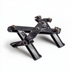 Close-up of mechanical scissor jack with black metal construction and precision engineering isolated on white background.