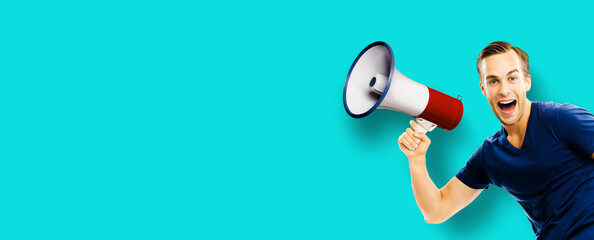 Funny happy expressive man in t-shirt advertise use mega phone loudspeaker bullhorn, isolate blue green color background. Black Friday sale price discount ad concept. Banner image with free text space
