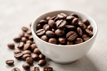 Fototapeta premium White bowl containing whole coffee beans, unroasted, beans