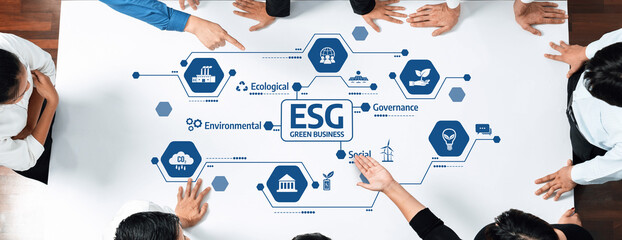 Diverse team discusses ESG principles for green businesses, focusing on ecological, social, and governance strategies for sustainable development and corporate responsibility. Amity