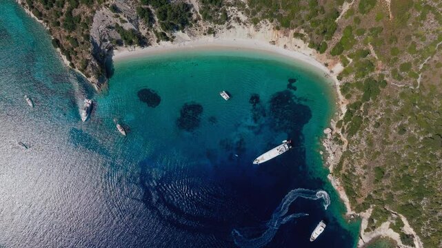 Aerial video of turquoise paradise sandy beach and bay of Filiatro in Ithaca Island, Greece