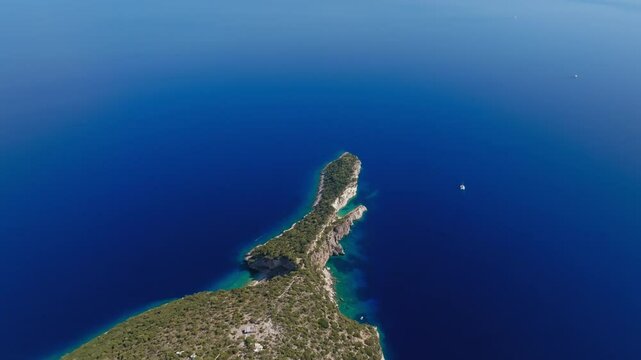 Drone footage of tranquil Hulla Beach on Ithaca Island, Greece