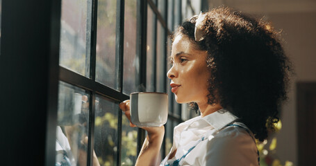 Coffee, reflection and African woman by window with ideas, inspiration and daydreaming in home....