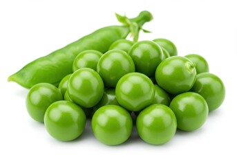 A close up shot of a pile of fresh green peas and a pod on a white background in bright light