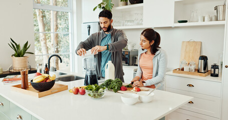 Home, blender and couple with smoothie, ingredients and balance with health benefits, fruits and nutrition. Kitchen, people or man with woman, detox and wellness with meal prepare, breakfast and diet