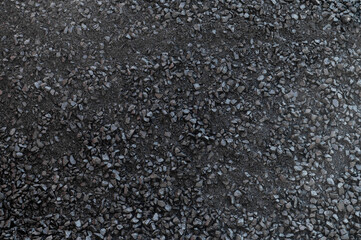 black asphalt road stone texture background black granite gravel