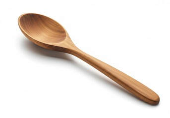 A single wooden spoon lying diagonally on a white surface with a slightly blurred background view here now
