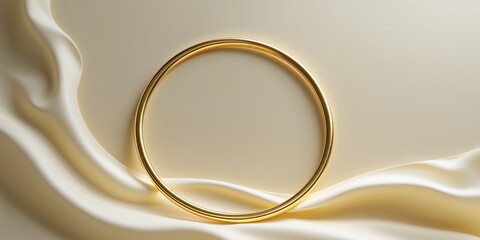 A golden circular frame resting on a soft cream surface.
