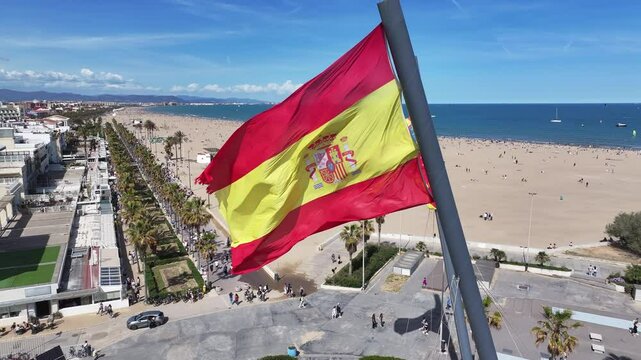 Spanish Flag At Valencia In Valence Community Spain. Spain  Flag Scenery. Flag Wave Scene. Patriotic Spain Landscape. Spanish Flag At Valencia In Valence Community Spain.