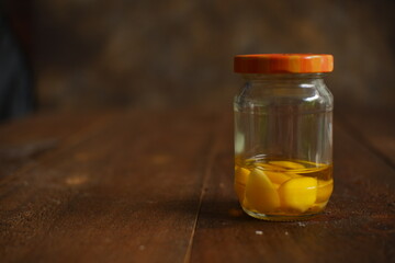 Infused garlic oil in a glass jar