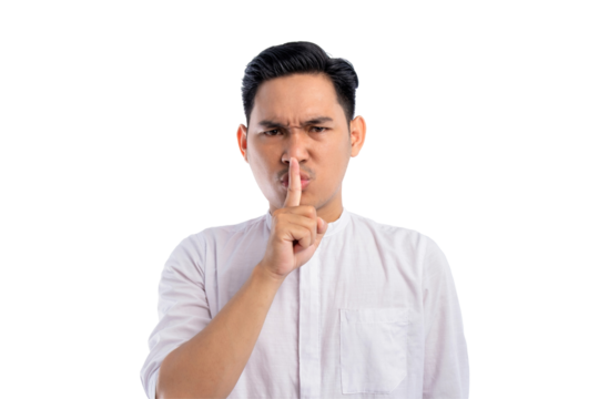 Handsome Asian Muslim man keeping a secret or asking for silence isolated on transparent background