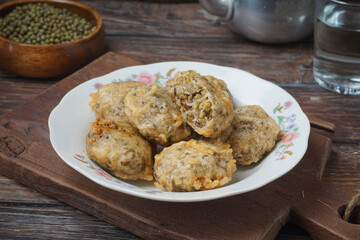 Traditional Malay Kuih Kacang Hijau Also Known as Kuih Kasturi in a Cozy Lifestyle Setting