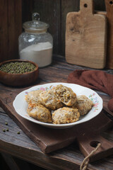 Traditional Malay Kuih Kacang Hijau Also Known as Kuih Kasturi in a Cozy Lifestyle Setting