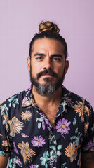 Bearded Man with Bun Hairstyle: A portrait of a man with a stylish topknot, a neatly trimmed beard, and a focused gaze, wearing a floral shirt against a soft backdrop.