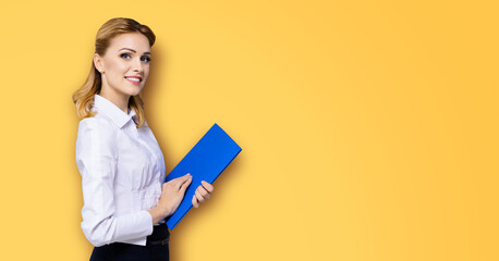 Portrait image - happy smile business woman businesswoman teacher, real estate agent hold blue...