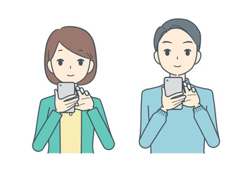スマホを操作する男性と女性
