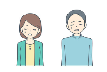 悲しそうに俯く男性と女性