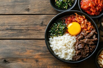 Delicious Korean Bibimbap: Steamed rice, marinated beef, kimchi, egg, and greens in a bowl.