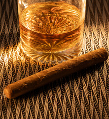 3. Premium Whiskey and Cigar Lifestyle Shot with Warm Moody Lighting.