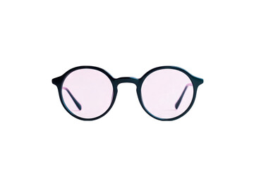 a pair of stylish black glasses rests against a soft pink background highlighting their minimalist design and clear lenses suggesting a focus on fashion and functionality