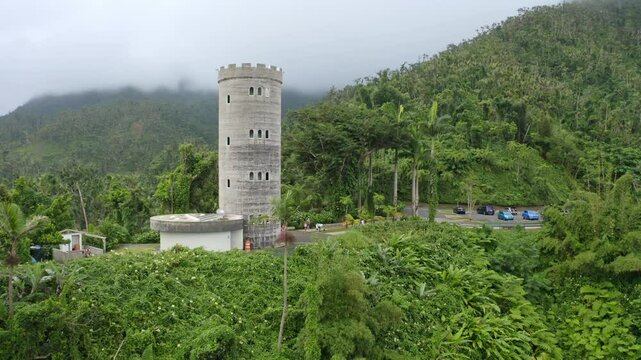 Drone shot of the Yokahu Tower within El Yunque National Forest in Puerto Rico, on a cloudy day