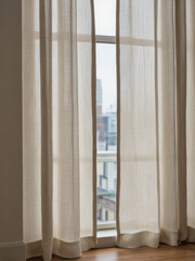 Everyday objects - for downstream advertisement and design: Sheer white linen curtains hang gracefully over a window, softly diffusing the natural light and revealing a blurred cityscape in the back