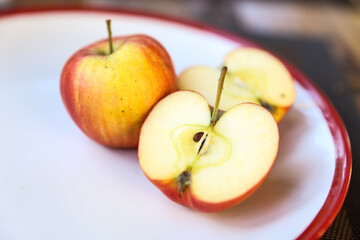 beautiful red apples on a plate