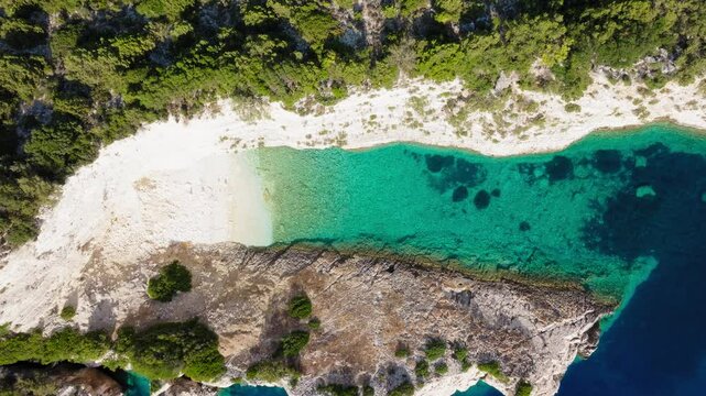 Rising top down shot of paradise beach in Ithaca island, Greece