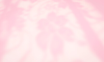 Pink Shadow of leaves tree plant overlay on white wall. Sunlight effect shadow on the wall. Minimal blurred backdrop backgrounds. Summer tropical surface background