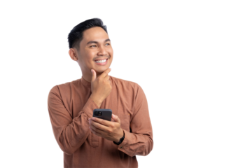 Smiling Asian Muslim man using smartphone, looking away, ordering food online in app isolated on transparent background