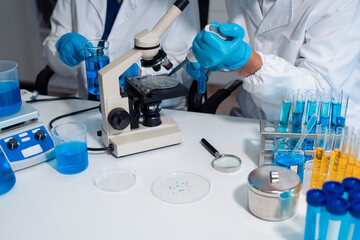 Fototapeta premium Scientist in laboratory study and analyze scientific sample.
