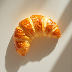 Golden Brown Croissant with Crispy Layers under Natural Light &ndash; Minimalist Composition Perfect for Bakery Branding, Menu Design, or Editorial Use