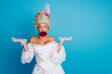 Charming woman in a baroque style gown posing with humor, blending aristocratic elegance and comedic charm