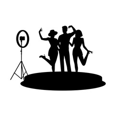 Silhouette of People Posing on 360 Photo Booth with Ring Light and Phone Camera