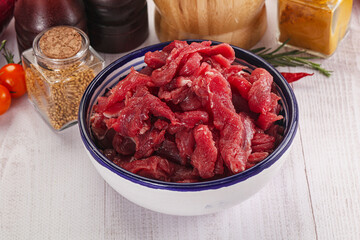 Raw beef meat - sliced strips