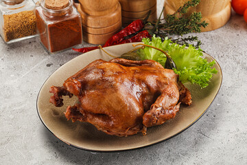 Baked small chicken with spices