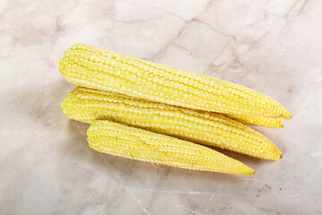 Raw sweet baby corn heap