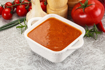 Hot tomato soup with diced chicken