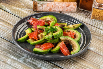 Salad with avocado and salmon