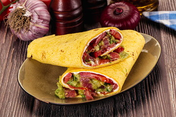 Burrito with tuna and vegetables wrap