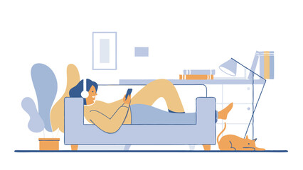 Obraz premium A young girl is relaxing in her new apartment, lying on a cozy sofa. She is enjoying music on her headphones using a mobile application on her smartphone. Next to her is her pet.
