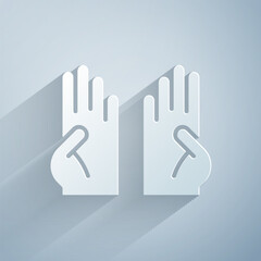 Paper cut Rubber gloves icon isolated on grey background. Latex hand protection sign. Housework cleaning equipment symbol. Paper art style. Vector